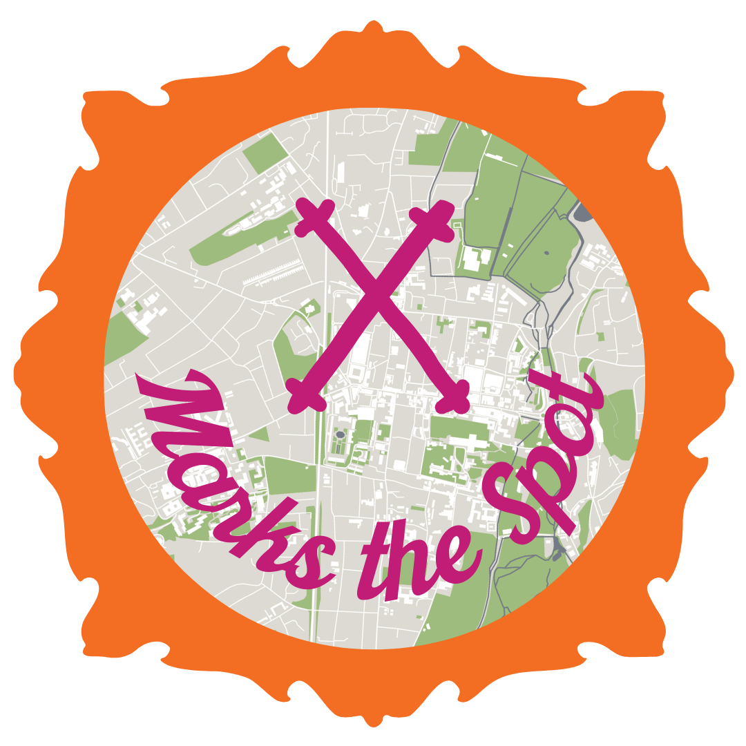 X marks the spot over a simple map of Winchester, set in a frame - a badge